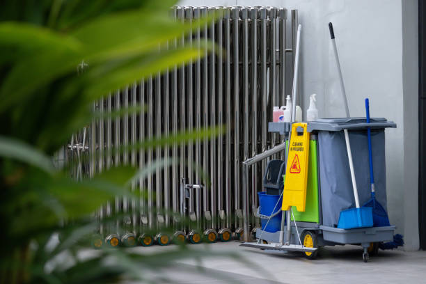 istock A cleaning cart with a yellow sign on it that says 