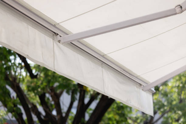 istock A white canopy with a green tree in the background 2163630329