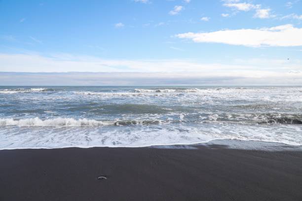 istock sea and sky. waves on the beach 2163633166