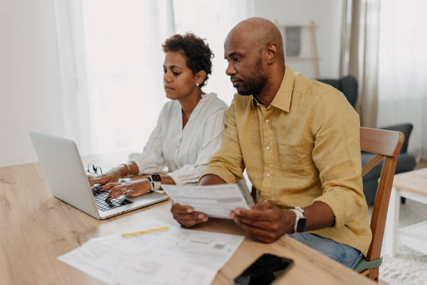 istock Couple focuses on financial planning using technology 2163635324