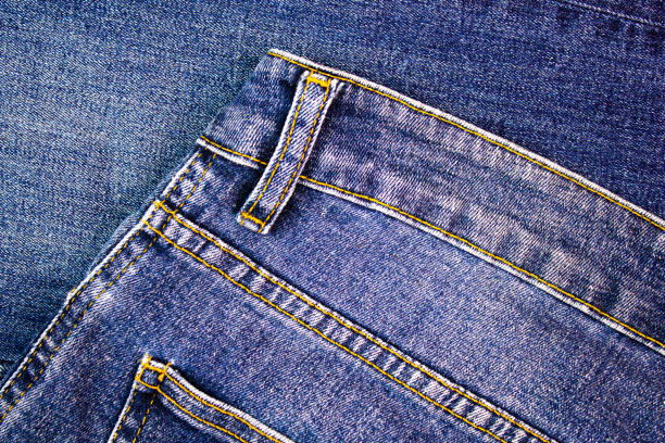 Classic men's jeans. Original denim pants, dark blue color.