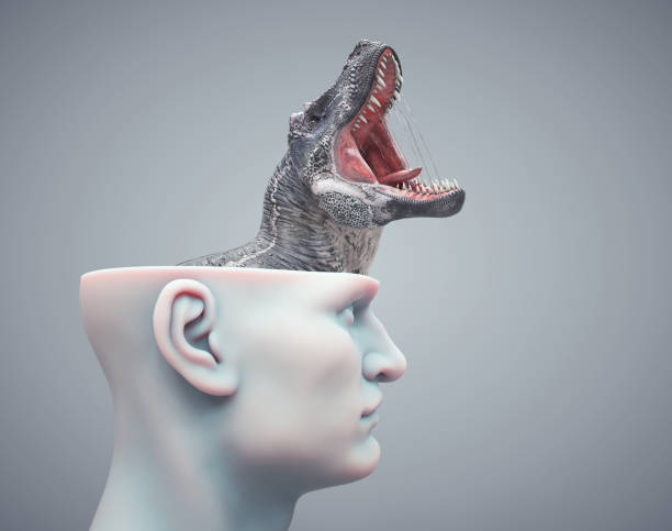 Dinosaur comes out of a man's head roaring.