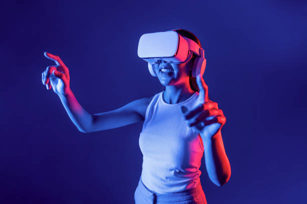 istock Elegant female connect metaverse use finger point virtual object. Hallucination. 2163643595
