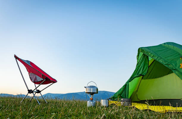 istock Camping high in the mountains with mountain views. 2163643851