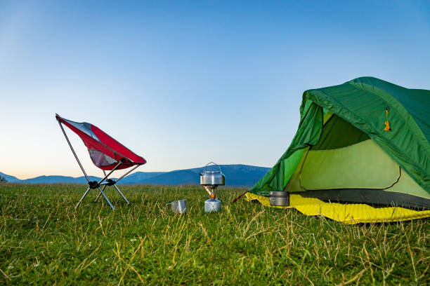 istock Camping high in the mountains with mountain views. 2163643860