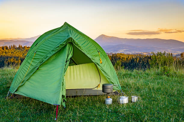 istock Camping high in the mountains with mountain views. 2163643873