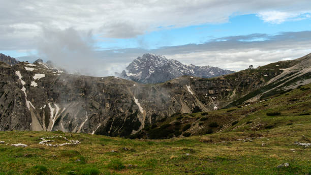 istock Snow and Clouds: Tre Cime Circuit in June 2163650956