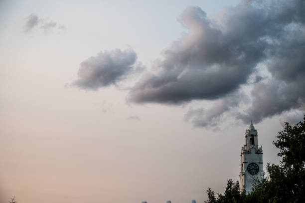Clock tower in the Montreal Old port at the sunset of summer
