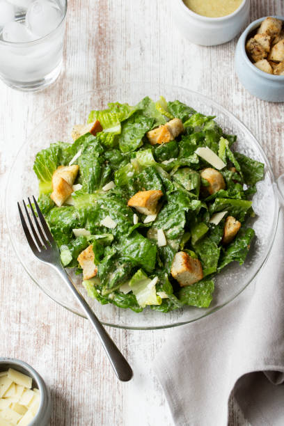 istock Classic Caesar Salad with Croutons and Shaved Parmesan 2163653237