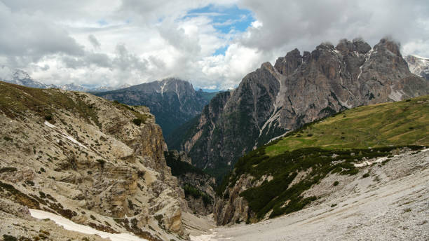 istock Snow and Clouds on Tre Cime Circuit with Dolomite Views 2163653460