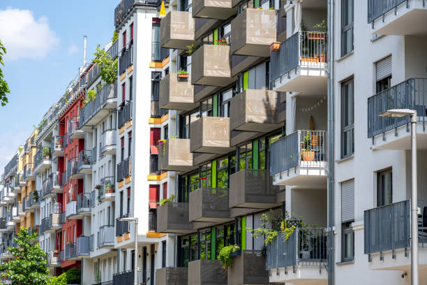 istock Street lined with apartment buildings 2163653554