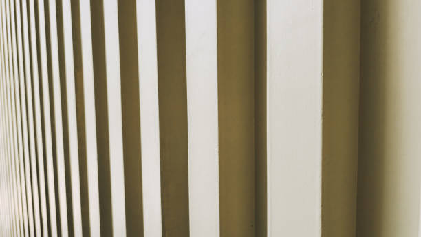 istock Abstract curved and striped wall 2163657060