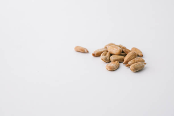 Sunflower seeds isolated on white background.