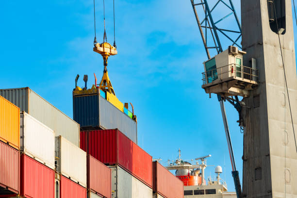istock Cargo ship being loaded with containers at port in Chile 2163658930