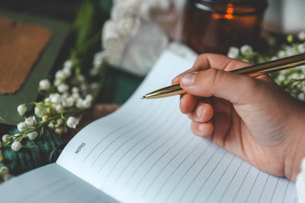 istock Girl writes in a notebook, aesthetics 2163659617