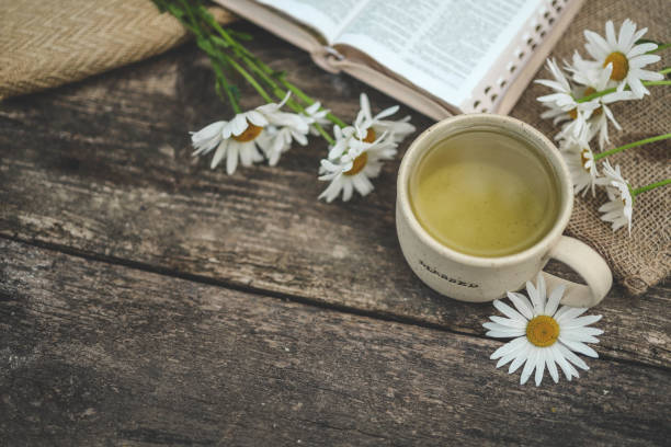 istock Cup with the inscription blessed and open Bible, Christian concept 2163660070