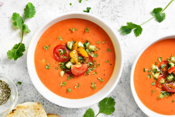 istock Delicious gazpacho soup in bowl over light stone background 2163660623