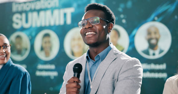 istock Presenting, black man or smile at seminar for speech, climate change or sustainability. Male researcher, representative or speaking at event for environment care, innovation or conference intro 2163665276