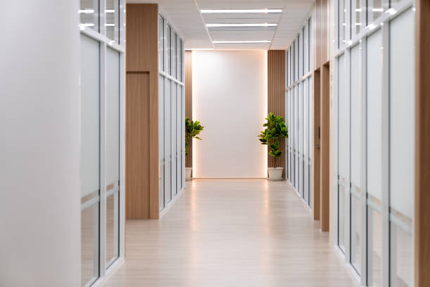 istock Empty modern office bright corridor with glass wall. Hall way. Ornamented. 2163668382