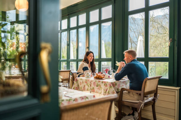 istock Caucasian Couple at Boutique Hotel Breakfast 2163669364
