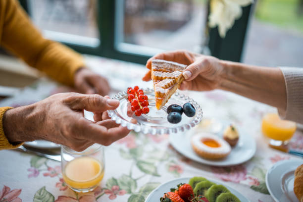 Senior Couple Having Breakfast in Boutique Hotel