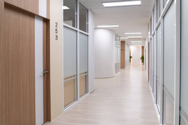 istock Empty modern office bright corridor with glass wall. Hall way. Ornamented. 2163669499