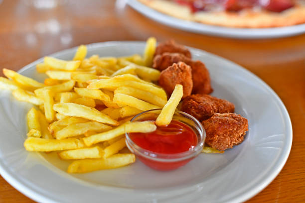 French fries are deep-fried, diced or sliced potatoes of disputed origin from Belgium or France.