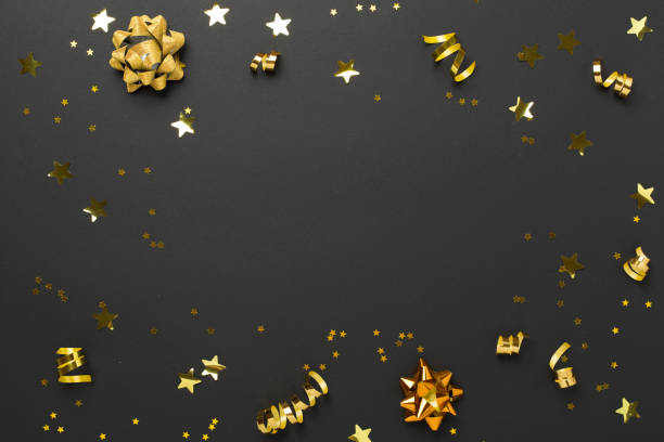 istock Golden confetti on color background, top view 2163670206