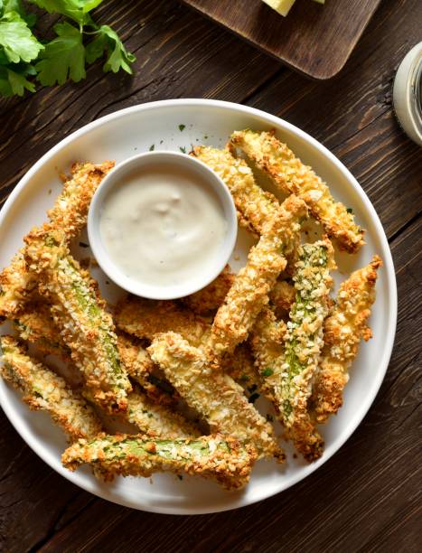 istock Crunchy zucchini breaded sticks with dip sauce 2163671769