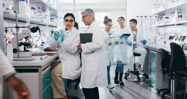 istock Petri dish, people or scientist learning in lab for breakthrough, cure or medical development. Training, internship and research with mentor or science team in clinical trial for medicine particles 2163671994