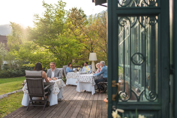 istock Diverse Friends Enjoying Meal on Hotel Terrace 2163672478