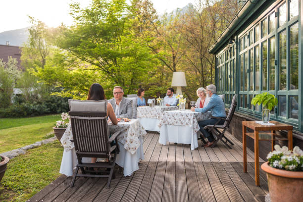 istock Diverse Group Enjoys Alfresco Dining at Boutique Hotel Terrace 2163672501