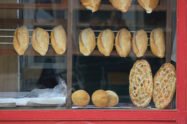Various breads and pitas in the window of a bakery in Turkey.Retro bakery window.