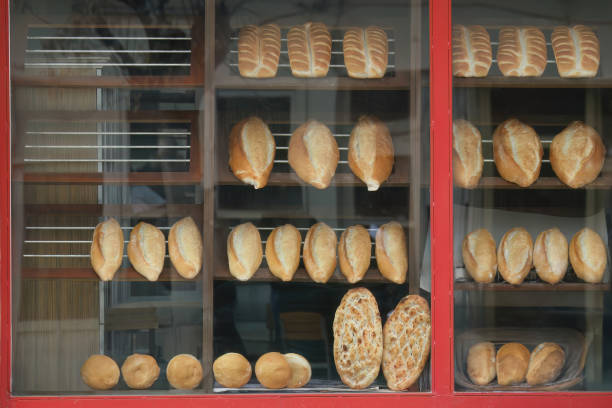 Various breads and pitas in the window of a bakery in Turkey.Retro bakery window.