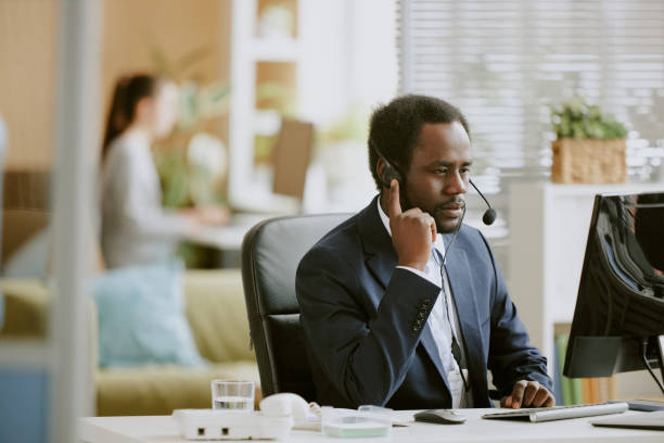 istock African American Operator Having Online Meeting 2163675335