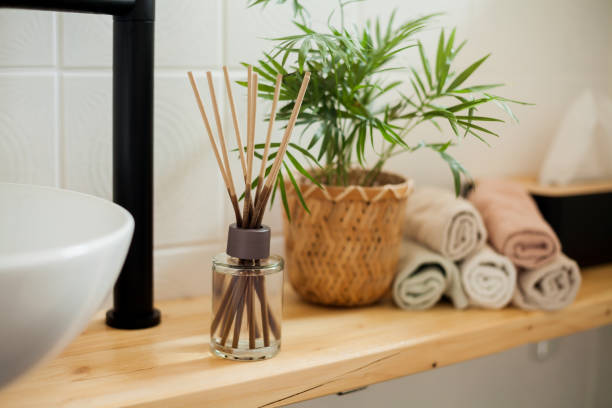 istock Bathroom in black and white. Home decor. Sink, hand towels, diffuser, house flower. Cozy. 2163675671