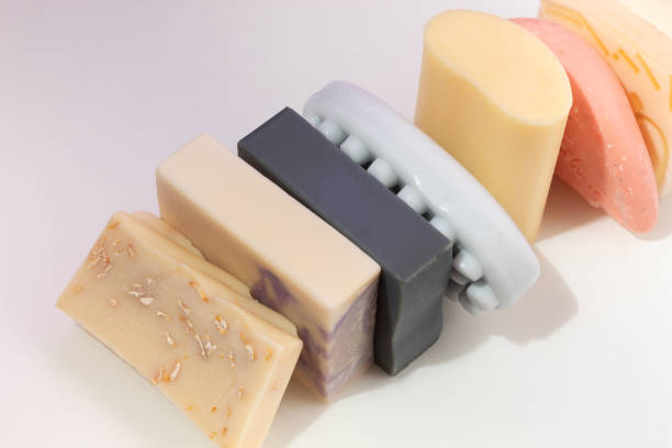 istock Creative pattern made of homemade soap on white background. Top view of environmental protection concept 2163675792