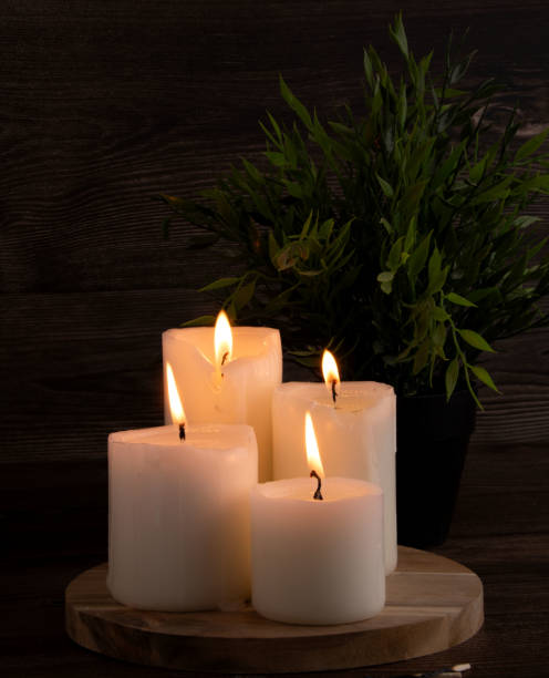 istock candle, romantic, spa, burning, candlelight, table, holiday, flame, still life, darkness, lifestyle, decoration, light, fire, night, wax, dark, celebration, burn 2163676259