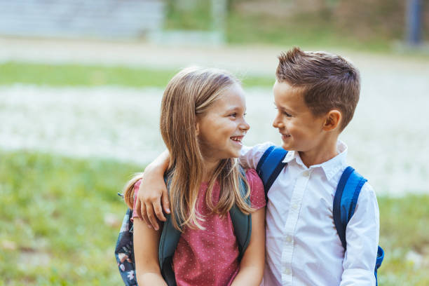 istock Cheerful Caucasian Siblings Ready for School Day 2163677065
