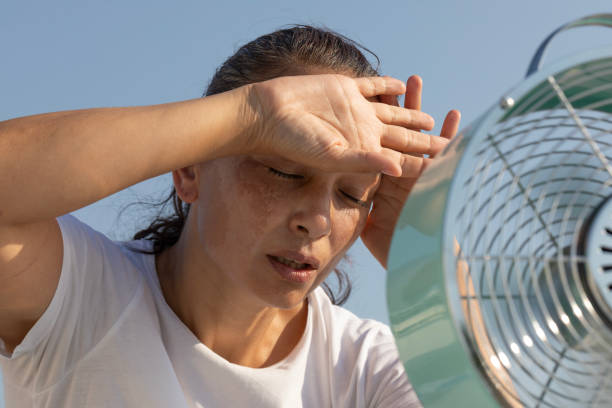 istock Woman with Fan 2163678530