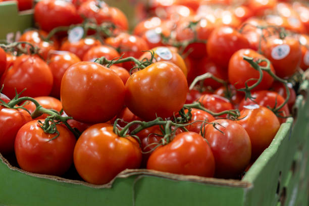 istock Organic Tomatoes Displayed at a Supermarket 2163680339