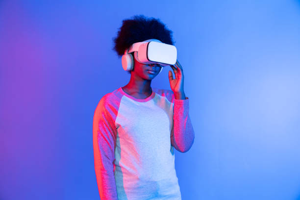 istock Profile thinking beautiful African wearing VR glasses metaverse. Contrivance. 2163683030