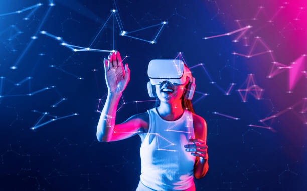 istock Female wear VR headset touch virtual reality object in metaverse. Hallucination. 2163684729