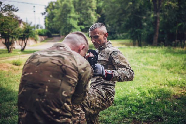 istock Soldiers practice combat techniques in outdoor drill 2163685424