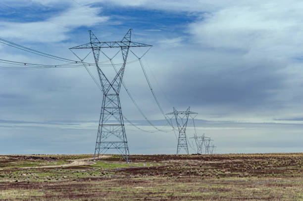 istock High Voltage Power Lines Stretching Across Rural Landscape 2163691543