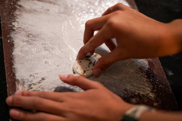 istock Grinding polymer plaster form with sandpaper during handmade workshop. 2163694750