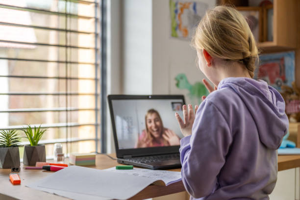 istock Young Girl in Online Learning Session with Teacher 2163698489
