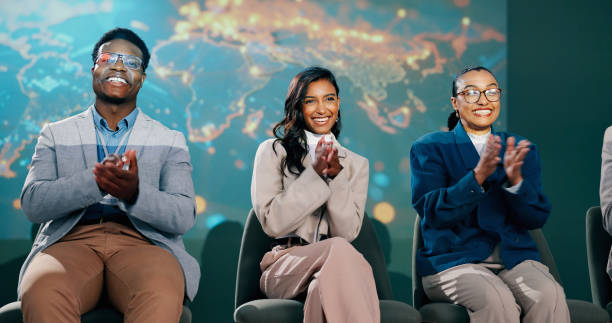 istock People, convention and stage for applause at presentation on global connectivity with web 3.0 at event. Man, women and happy for innovation with internet, future or digital transformation at seminar 2163703344