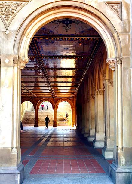 istock a hallway with a person walking in it 2163705778