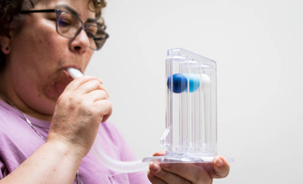 istock Breathing exercises with a medical tool 2163709297